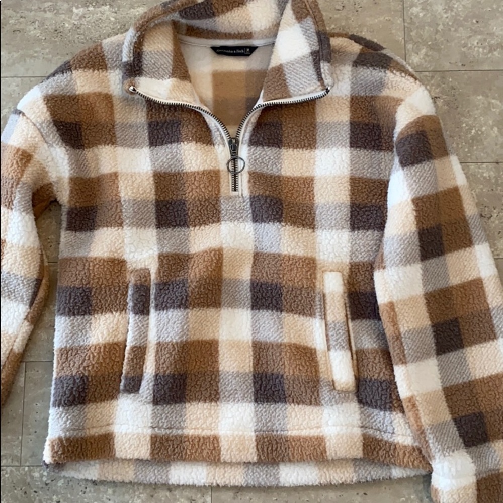camel plaid 1/2 zip sherpa fleece pullover.